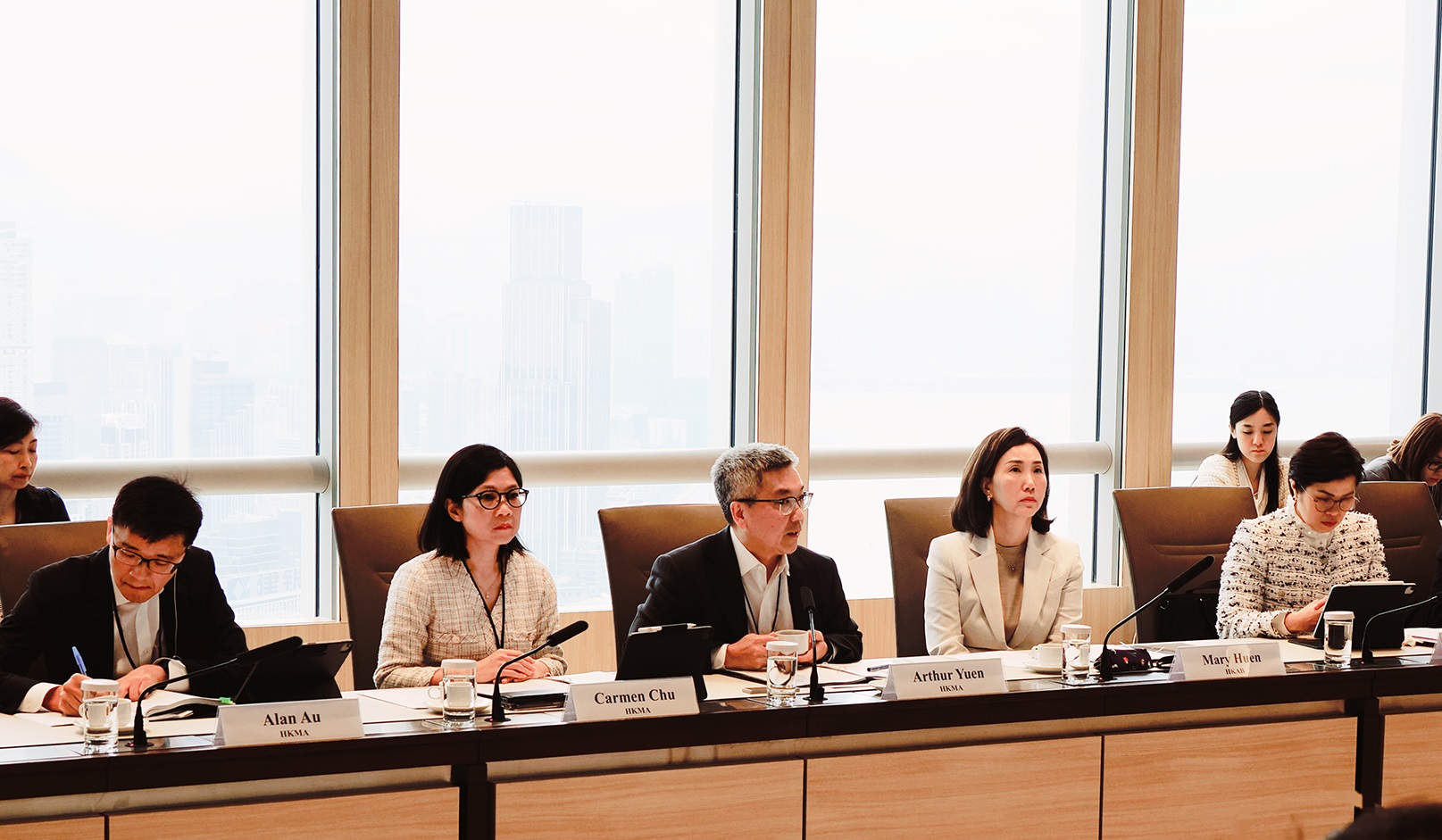 Mr Arthur Yuen, Deputy Chief Executive of the Hong Kong Monetary Authority (HKMA) (third from left), and Ms Mary Huen, Chairperson of the Hong Kong Association of Banks (HKAB) (first from right), co-chair the meeting of the Taskforce on SME Lending, joined by Ms Carmen Chu, Executive Director (Banking Supervision) of the HKMA (second from left), Mr Alan Au, Executive Director (Banking Conduct) of the HKMA (first from left), and Ms Winnie Tung, Chairperson, Commercial Banking Committee of HKAB (first from right).